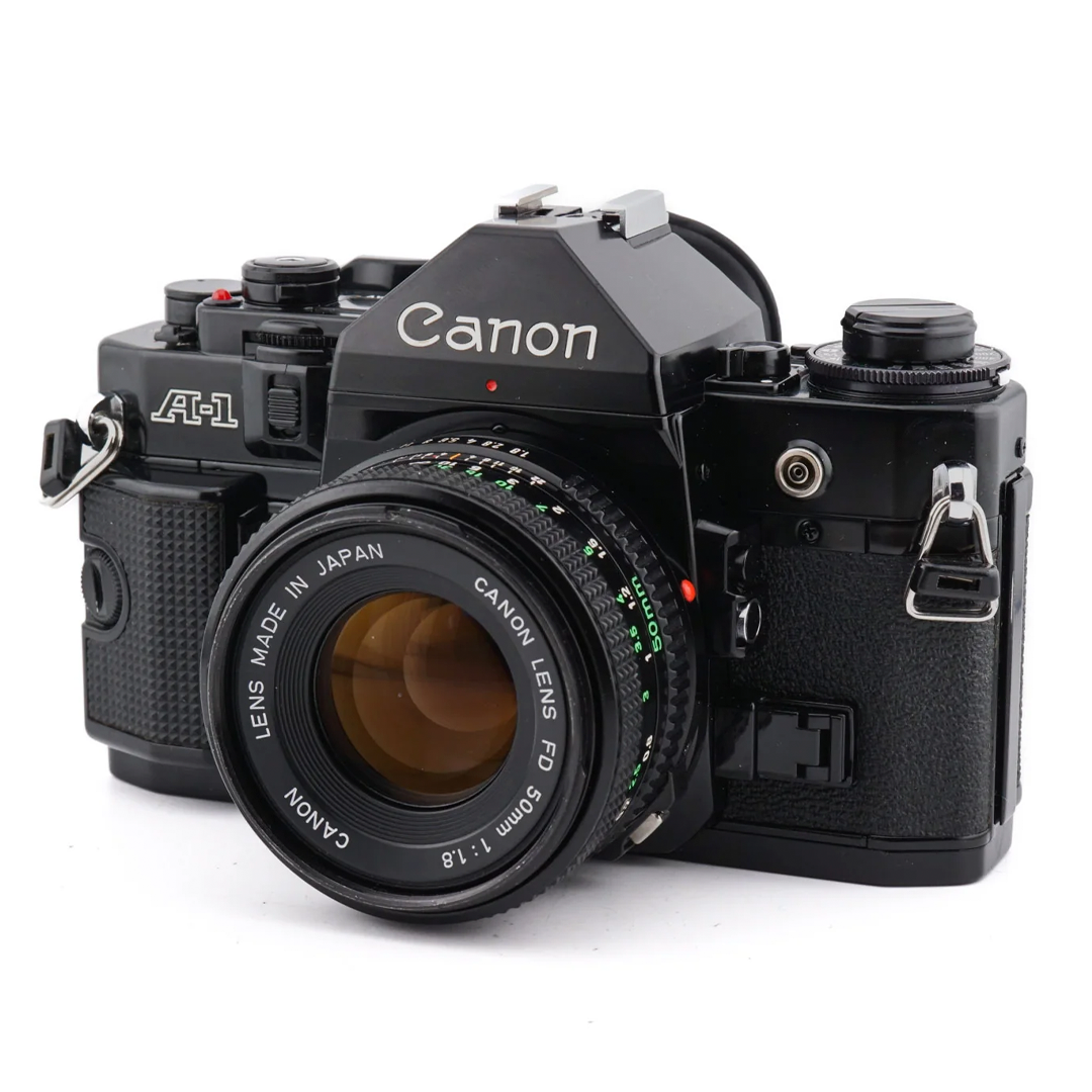Canon A-1 + 50mm FD 1.8 - Vintage 35mm Analog SLR Camera  · main image