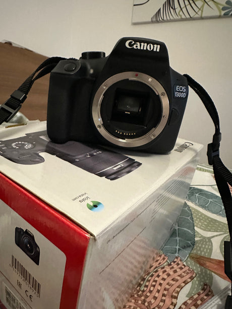 Canon1300d9565899c-1c5b-49f6-b64c-885b6cb526ab