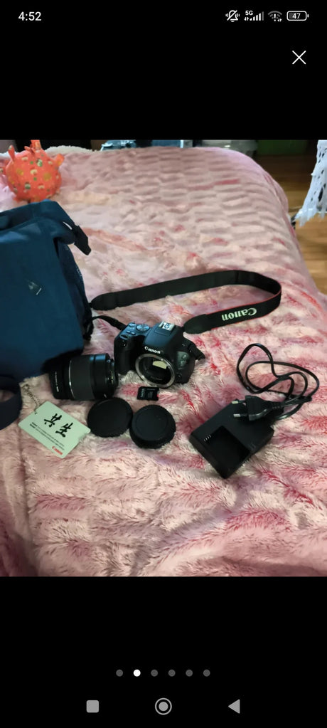 Canon EOS 200D265a7488-ef24-441e-b817-9eaf36788eef